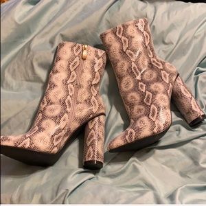 Fabric snakeskin boots as Kylie a Jenner wore